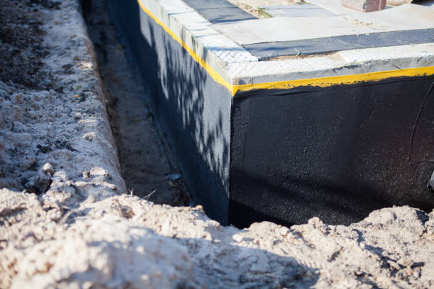 Professional Waterproofing technician working in Shirley, IN